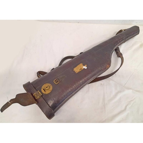 1151 - LEATHER SPORTING GUN CASE WITH LEATHER STRAP, CARRY HANDLE AND LOCK COVER WITH BRASS LOCK AND MOUNTS