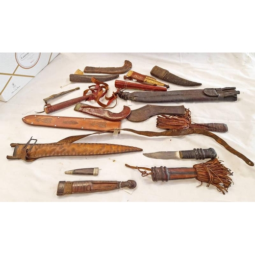 1232 - EXTREMELY GOOD SELECTION OF MIDDLE EASTERN WORKED LEATHER SHORT SWORD & DAGGER SCABBARDS, ETC