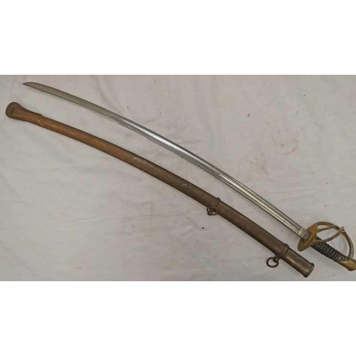 1306 - 19TH CENTURY GERMAN CAVALRY OFFICERS SWORD WITH 89CM LONG SINGLE EDGED CURVED AND FULLERED STEEL BLA... 