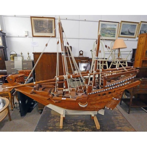 1361L - CARVED WOODEN MODEL OF A BOAT WITH CARVED DECORATION, OVERALL LENGTH 141 CM