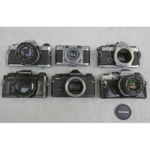 2115 - 5 OLYMPUS 35MM CAMERAS INCLUDING OM-2, OM-10, OM-40 & PAXETTE CAMERA