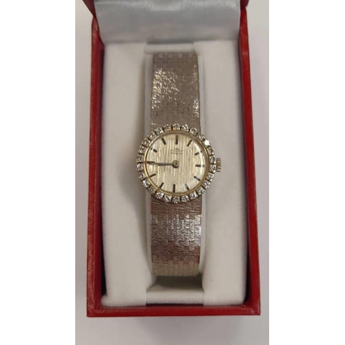 40 - 18K WHITE GOLD LADIES PAYOT WRISTWATCH SET WITH DIAMONDS ON AN 18CT GOLD BRACELET - 17CM LONG, 43G