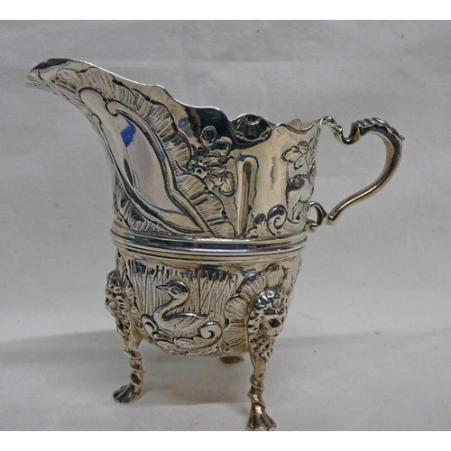 48 - VICTORIAN SILVER CREAM JUG EMBOSSED WITH BIRDS, FOXES, ETC WITH LIONS MASK DECORATION ON PAW FEET, C... 