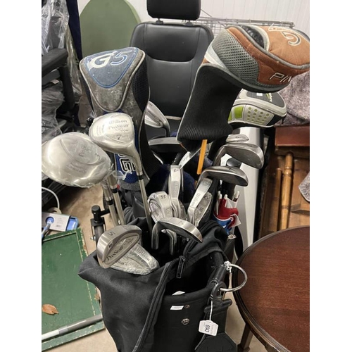 6043 - GOLF BAG AND VARIOUS WILSON PROSTAFF OD PLUS GOLF CLUBS - SOME STILL WRAPPED