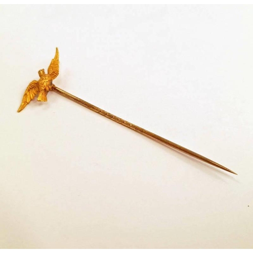 76 - LATE 19TH CENTURY YELLOW METAL TIE PIN IN THE FORM OF A BIRD IN FLIGHT WITH DIAMOND SET EYE - 2.8 G