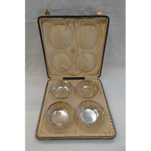 95 - CASED SET OF 4 SILVER CIRCULAR DISHES WITH PIERCED DECORATION, BIRMINGHAM 1921 RETAILED BY P. ORR & ... 