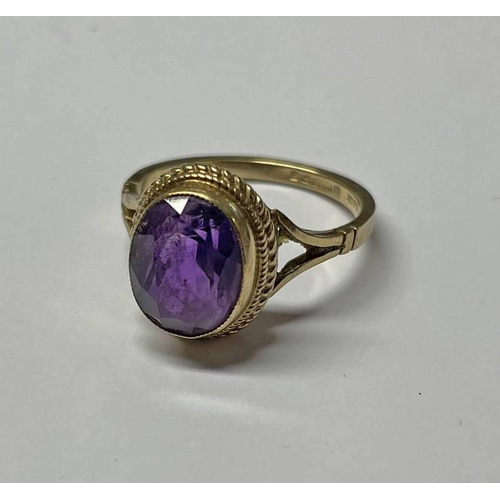 98 - 9CT GOLD OVAL AMETHYST SET RING - 3G