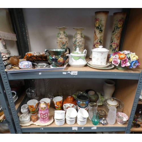 3379 - 2 SHELVES OF VARIOUS ORNAMENTS & GLASSWARE INCLUDING PAIR OF JAPANESE VASES, GOUDA VASES