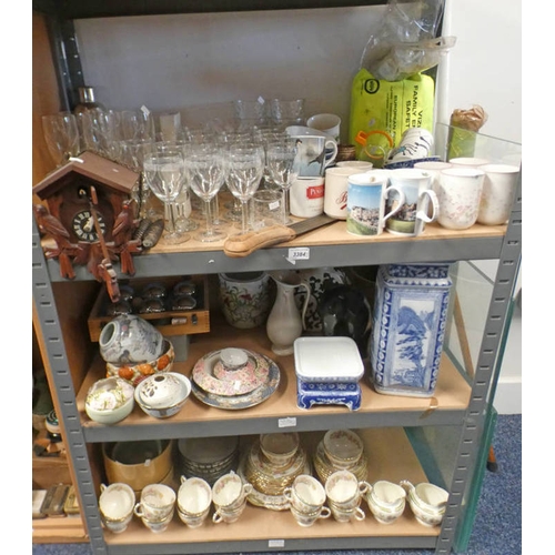 3384 - 3 SHELVES OF GLASSWARE, CUCKOO CLOCK, SUTHERLAND CHINA TEASET, CASED BOULES, ETC