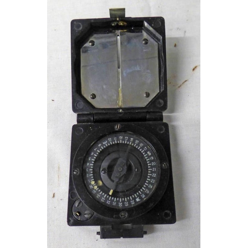 1054 - MAGNETIC MARCHING MILITARY COMPASS, MARK 1 BY T G CO. LTD, B74923 STAMPED ON BACK, IN A BLACK PLASTI... 