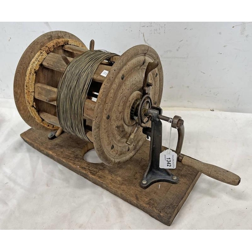 1342 - WOOD AND METAL WINDING SPOOL, NOTCHED GEAR TO HANDLE SIDE, 46 CM ACROSS