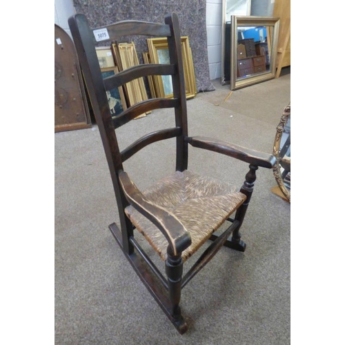 5075 - CHILD'S OAK LADDER BACK ROCKING CHAIR WITH RUSH WORK SEAT