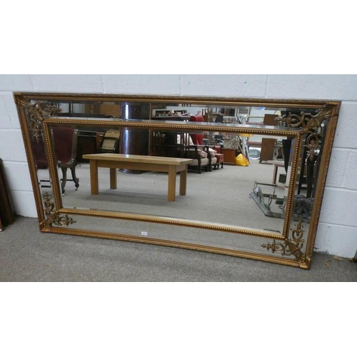 5123 - GILT MIRROR WITH CARVED  DECORATION, OVERALL SIZE 92 X 183 CM