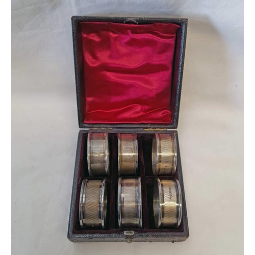 52 - CASED SET 6 SILVER ENGINE TURNED NAPKIN RINGS BY SAUNDERS & MACKENZIE, BIRMINGHAM 1927/28 - 62 G