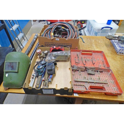 6028 - VARIOUS WELDING RELATED ITEMS TO INCLUDE 3 BUNDLES OF WELDING RODS, NOZZLES, GOGGLES, ETC