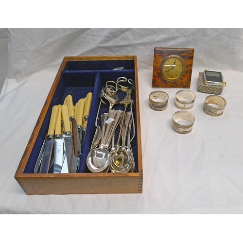 667 - TRAVEL CLOCK, SILVER PLATED CUTLERY, NAPKIN RINGS ETC