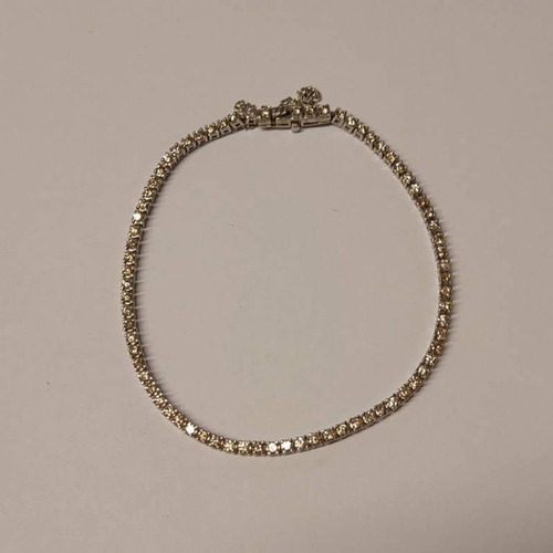 84 - 18CT GOLD DIAMOND SET LINE BRACELET THE BRILLIANT CUT DIAMOND APPROX 2.2 CARATS - 18 CM LONG