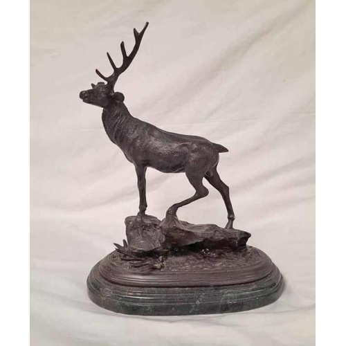 3032 - BRONZE FIGURE OF A STAG ON A ROCKY OUTCROP ON MARBLE PLINTH 39 CM TALL