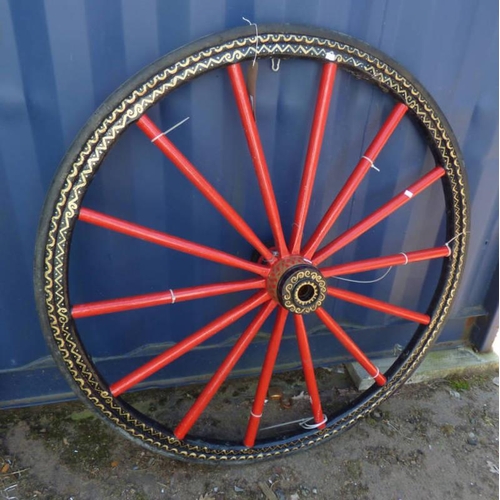 6097 - PAINTED WOODEN CART WHEEL WITH GILT DECORATION. SIGNED JOHN STEWART. DIAMETER 115 CM