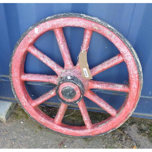 6098 - PAINTED RECONSTITUTED STONE CART WHEEL ORNAMENT. DIAMETER 60 CM