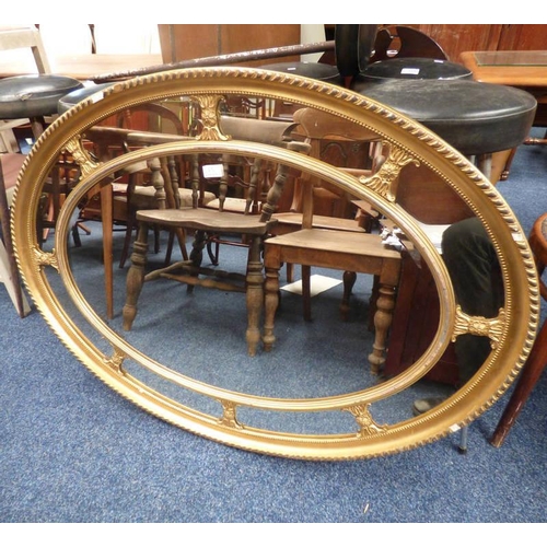 65 - GILT FRAMED OVAL MIRROR, INNER DIMENSIONS 55CM TALL X 85CM WIDE