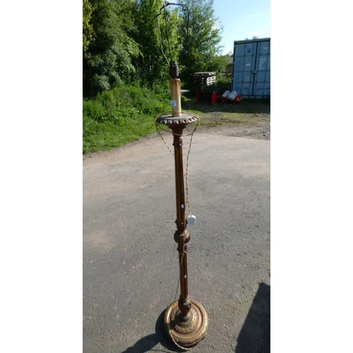 66 - GILT STANDARD LAMP WITH REEDED COLUMN ON CIRCULAR BASE.