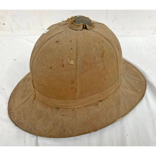 1002 - BRITISH PITH HELMET INTERIOR WITH SEVERAL MARKINGS TO INCLUDE 109945 LAING RFA, KIRRIEMUIR, SCOTLAND... 