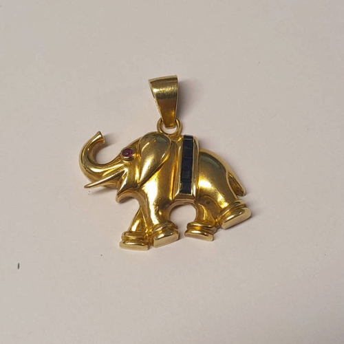 106 - 18CT GOLD ELEPHANT PENDANT SET WITH RUBY & SAPPHIRES - 3.5 CM LONG, 17.2 G