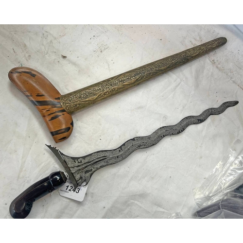 1243 - JAVANESE KRIS WITH 33CM STEEL BLADE, BEADED WHITE METAL COLLAR WITH ITS WOODEN HILT WITH EMBOSSED BR... 