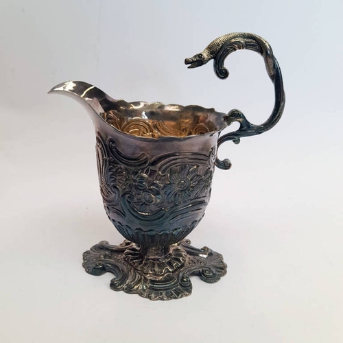 205 - 18TH CENTURY SILVER CREAM JUG WITH FLORAL DECORATION & SNAKE HANDLE BY WALTER BRIND, LONDON CIRCA 17... 