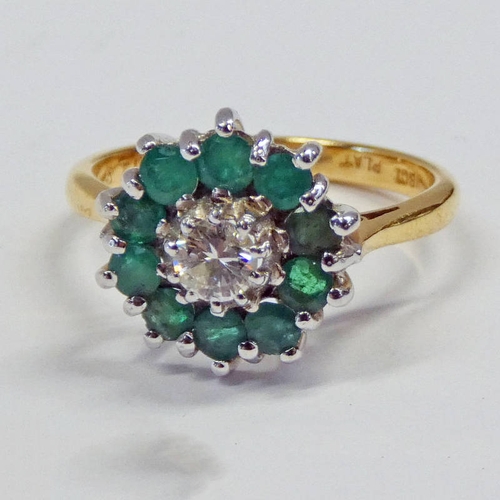 21 - DIAMOND & EMERALD CLUSTER RING IN SETTING MARKED 18CT & PLAT