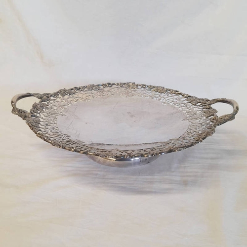 211 - LARGE SILVER 2-HANDLED PEDESTAL DISH DECORATED WITH PIERCED & GRAPE VINE BORDER BY EDWARD VINERS LTD... 