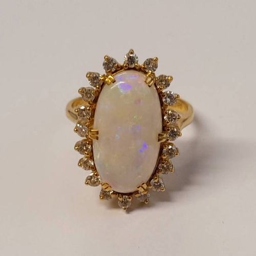 251 - 18CT GOLD OPAL & DIAMOND CLUSTER RING, THE OVAL OPAL SET WITHIN A SURROUND OF 20 BRILLIANT CUT DIAMO... 