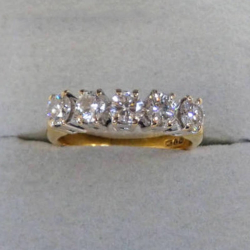 291 - 18CT GOLD 5 - STONE DIAMOND SET RING APPROX 1.25 CARATS IN TOTAL