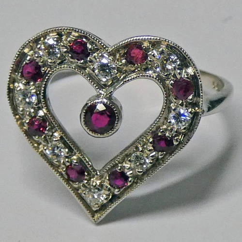 31 - 18CT GOLD RUBY & DIAMOND HEART SHAPED RING