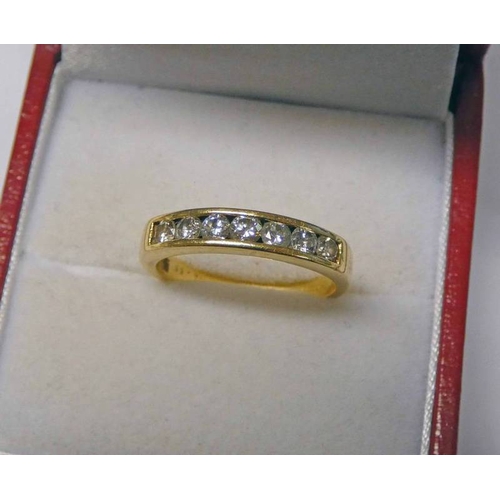 377 - 18CT GOLD DIAMOND SET 7 - STONE RING, APPROX 0.50 CARATS IN TOTAL