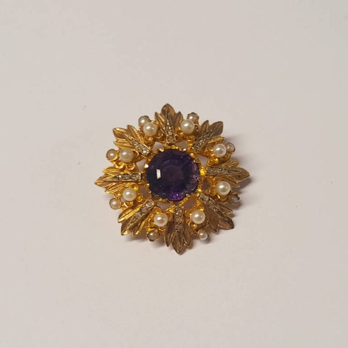 394 - EDWARDIAN GOLD CIRCULAR AMETHYST, PEARL & DIAMOND SET LEAF BROOCH - 3.3 CM DIAMETER, 11.2 G