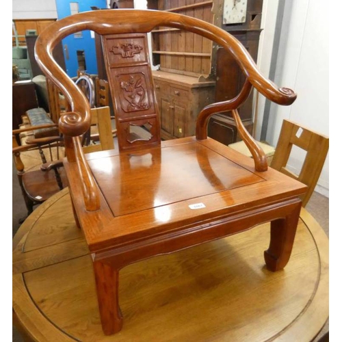 5061 - ORIENTAL ARMCHAIR WITH SHAPED ARMS, DECORATIVE CARVED BACK