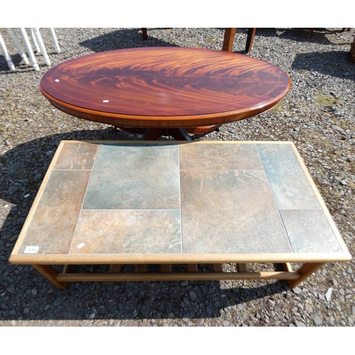 5064 - TEAK RECTANGULAR COFFEE TABLE WITH TILE INSET TOP 104CM LONG, & AN OVAL TOPPED MAHOGANY TABLE