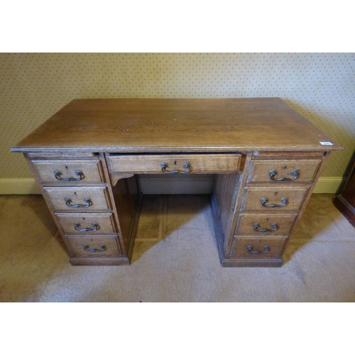 5082 - LATE 19TH EARLY 20TH CENTURY OAK KNEEHOLE DESK WITH CENTRALLY SET DRAWER FLANKED BY 2 BANKS OF 4 DRA... 