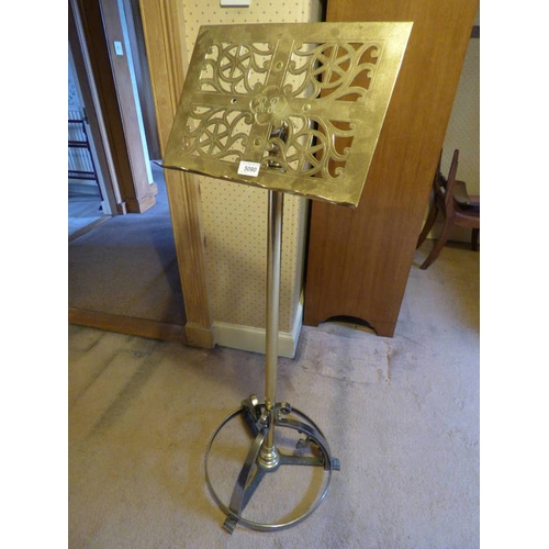 5090 - LATE 19TH CENTURY ADJUSTABLE BRASS LECTERN WITH BRASS PIERCED WORK ON EXTENDING COLUMN ON CIRCULAR W... 