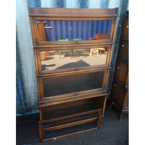 5426 - 20TH CENTURY OAK SECTIONAL BOOKCASE WITH 4 GLAZED PANEL DOORS LABELLED GLOBE-WERNICKE TO INTERIOR