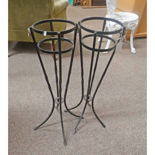 5552 - PAIR OF CIRCULAR METAL POT STANDS WITH BRASS HANDLES .  67 CM TALL