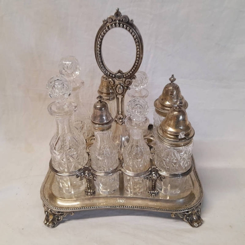 720 - VICTORIAN SILVER CONDIMENT STAND ON 4 SCROLL SUPPORTS & MATCHING SILVER  MOUNTED CUT GLASS BOTTLES B... 