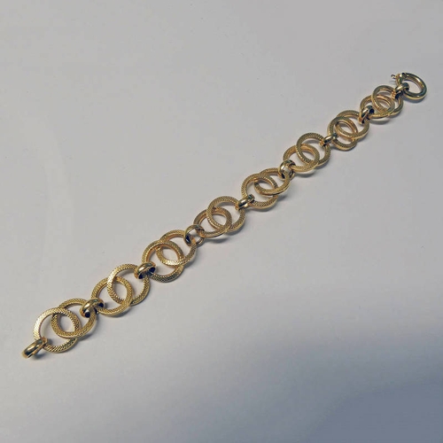 83 - YELLOW METAL CIRCULAR LINK BRACELET, UNMARKED - 17.8G