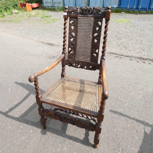 10 - LATE 19TH CENTURY CARVED  OAK FRAMED OPEN ARMCHAIR WITH BERGERE PANEL BACK & SEAT ON BARLEY TWIST SU... 