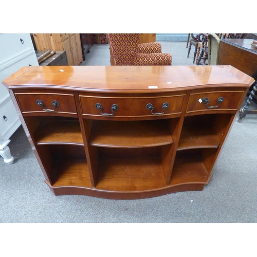 150 - YEW WOOD BOOKCASE WITH SERPENTINE FRONT & 3 DRAWERS OVER ADJUSTABLE OPEN SHELVES, 120CM LONG