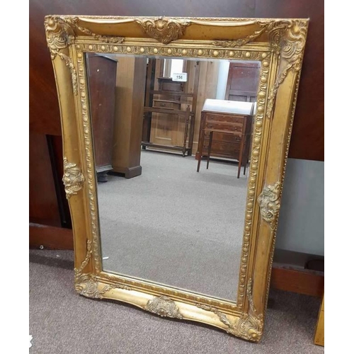 156 - RECTANGULAR MIRROR WITH DECORATIVE CARVED  GILT FRAME, INNER DIMENSIONS 74CM TALL X 48CM WIDE