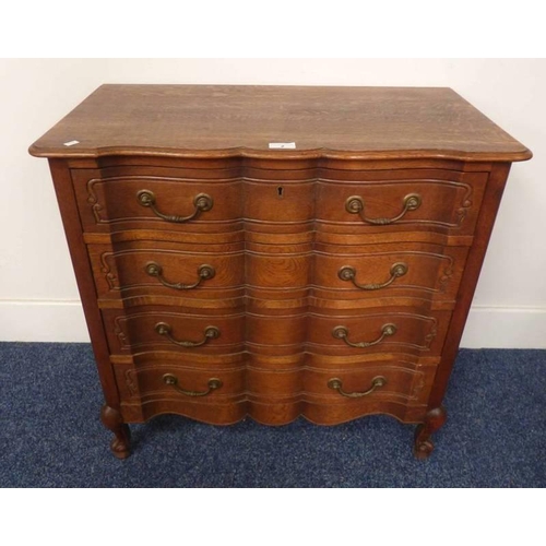 2 - 20TH CENTURY CONTINENTAL OAK CHEST OF DRAWERS WITH SHAPED FRONT & 4 DRAWERS ON CABRIOLE SUPPORTS. 72... 