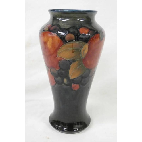 3041 - MOORCROFT POMEGRANATE BALUSTER VASE, SIGNED IN BLUE TO BASE - 23CM TALL